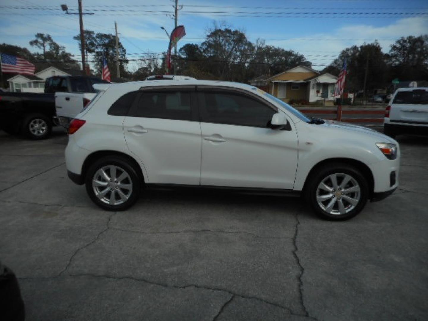 2013 WHITE MITSUBISHI OUTLANDER SPORT ES (4A4AP3AUXDE) , located at 10405 Abercorn Street, Savannah, GA, 31419, (912) 921-8965, 31.988262, -81.131760 - Photo#7