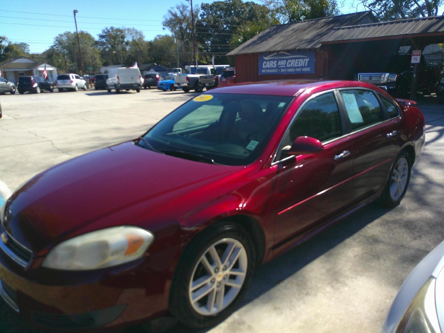 2011 RED CHEVROLET IMPALA LTZ (2G1WC5EM6B1) , located at 1200 Cassat Avenue, Jacksonville, FL, 32205, (904) 695-1885, 30.302404, -81.731033 - Photo#1
