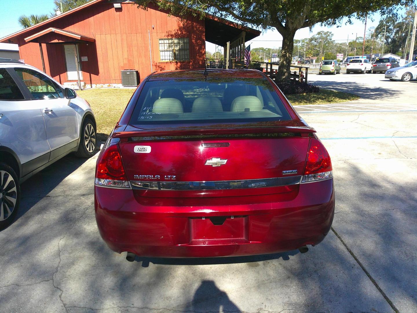 2011 RED CHEVROLET IMPALA LTZ (2G1WC5EM6B1) , located at 1200 Cassat Avenue, Jacksonville, FL, 32205, (904) 695-1885, 30.302404, -81.731033 - Photo#4