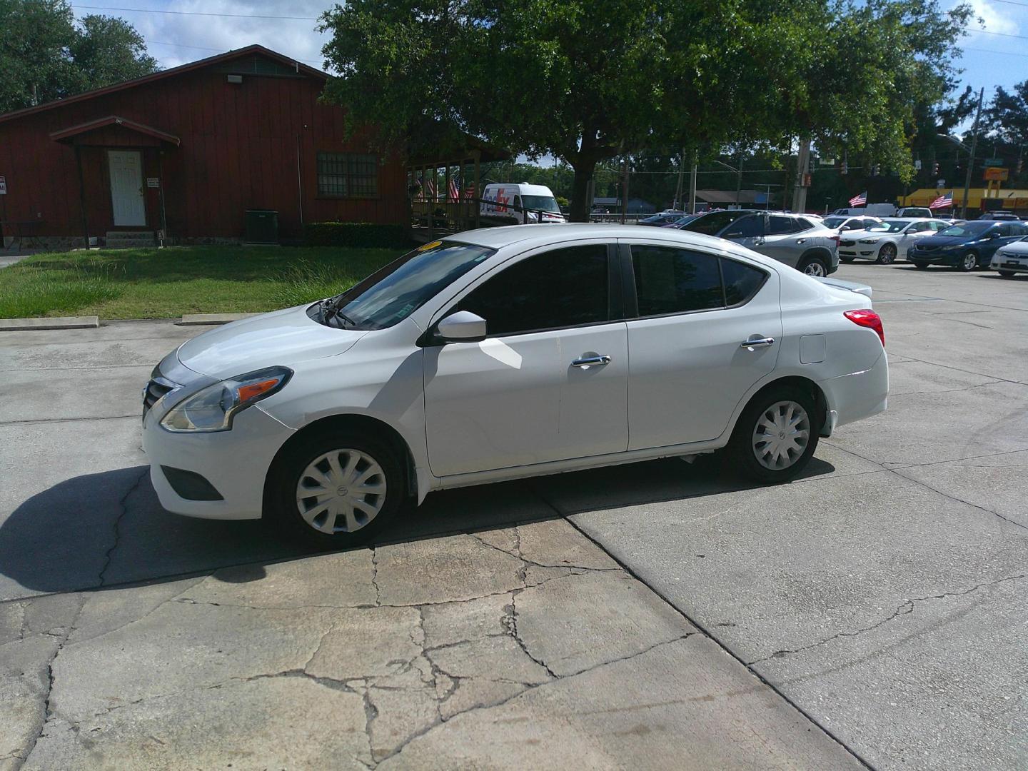 2016 WHITE NISSAN VERSA S; SL; SV (3N1CN7AP4GL) , located at 1200 Cassat Avenue, Jacksonville, FL, 32205, (904) 695-1885, 30.302404, -81.731033 - Photo#1