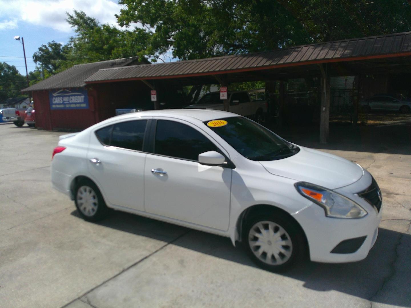 2016 WHITE NISSAN VERSA S; SL; SV (3N1CN7AP4GL) , located at 1200 Cassat Avenue, Jacksonville, FL, 32205, (904) 695-1885, 30.302404, -81.731033 - Photo#2