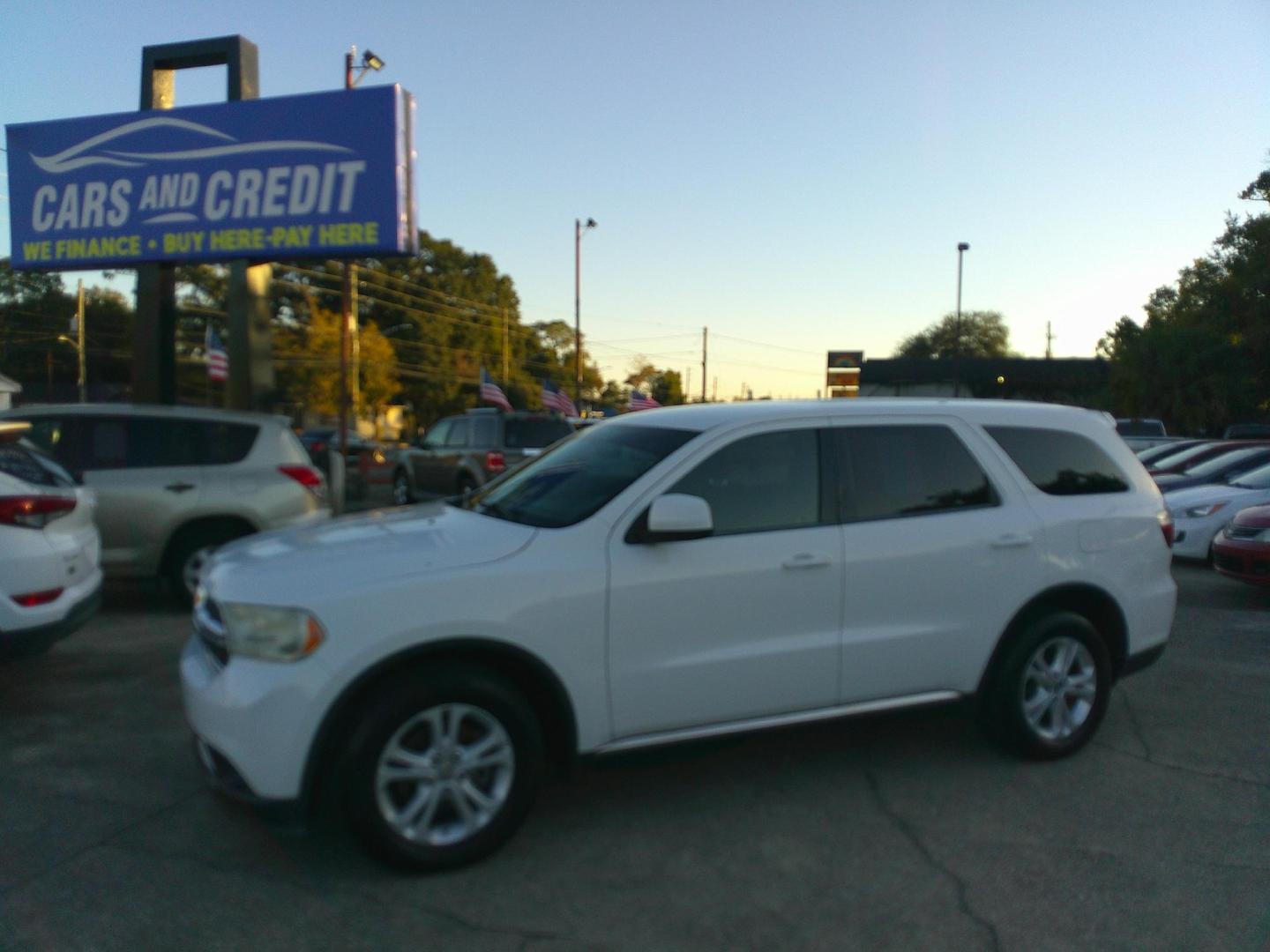 2013 WHITE DODGE DURANGO SXT (1C4RDJAG0DC) , located at 390 Hansen Avenue, Orange Park, FL, 32065, (904) 276-7933, 30.130497, -81.787529 - Photo#1