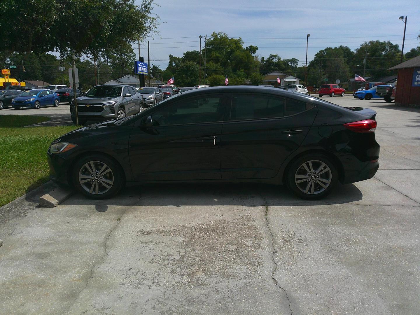 2017 BLACK HYUNDAI ELANTRA LIMITED; SE (5NPD84LF8HH) , located at 1200 Cassat Avenue, Jacksonville, FL, 32205, (904) 695-1885, 30.302404, -81.731033 - Photo#1