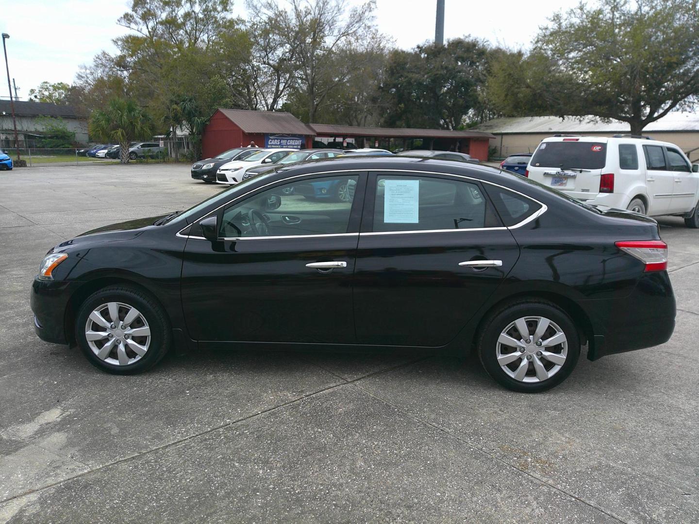 2015 BLACK NISSAN SENTRA SR; S; SL; SV (3N1AB7AP4FY) , located at 1200 Cassat Avenue, Jacksonville, FL, 32205, (904) 695-1885, 30.302404, -81.731033 - Photo#1