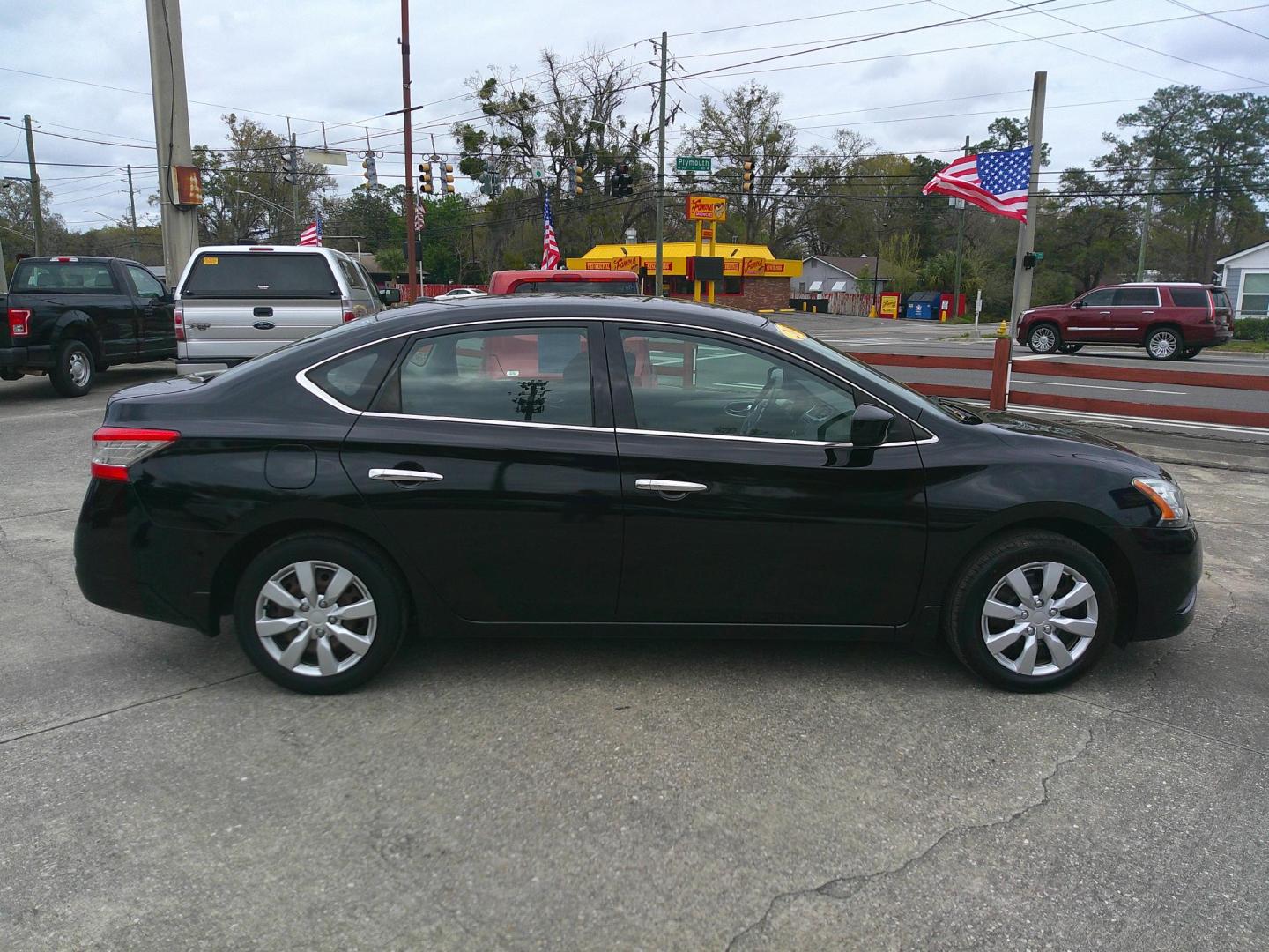 2015 BLACK NISSAN SENTRA SR; S; SL; SV (3N1AB7AP4FY) , located at 1200 Cassat Avenue, Jacksonville, FL, 32205, (904) 695-1885, 30.302404, -81.731033 - Photo#2