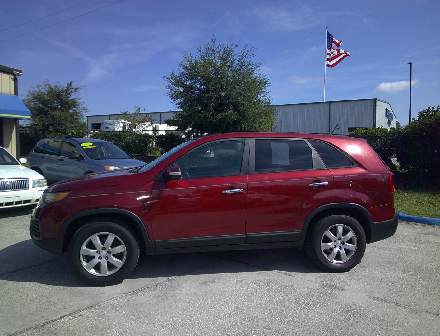 2011 RED KIA SORENTO BASE; EX; LX (5XYKT3A12BG) , located at 390 Hansen Avenue, Orange Park, FL, 32065, (904) 276-7933, 30.130497, -81.787529 - Photo#4