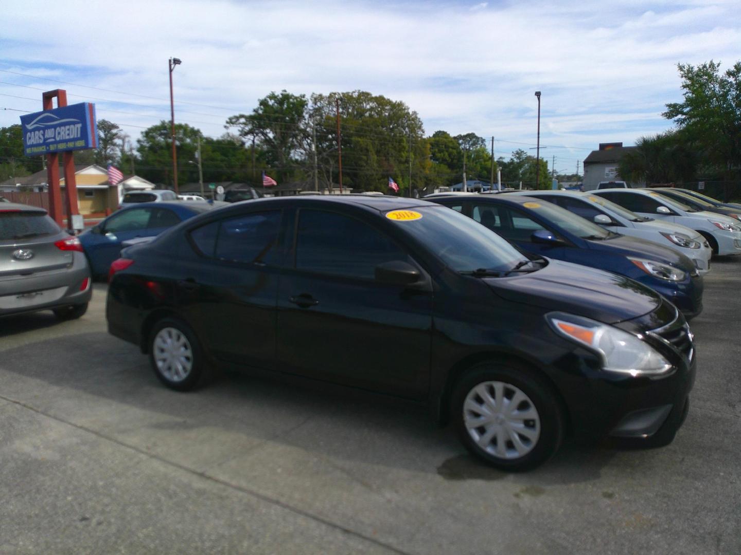 2018 BLACK NISSAN VERSA S; SL; SV (3N1CN7AP2JL) , located at 1200 Cassat Avenue, Jacksonville, FL, 32205, (904) 695-1885, 30.302404, -81.731033 - Photo#2