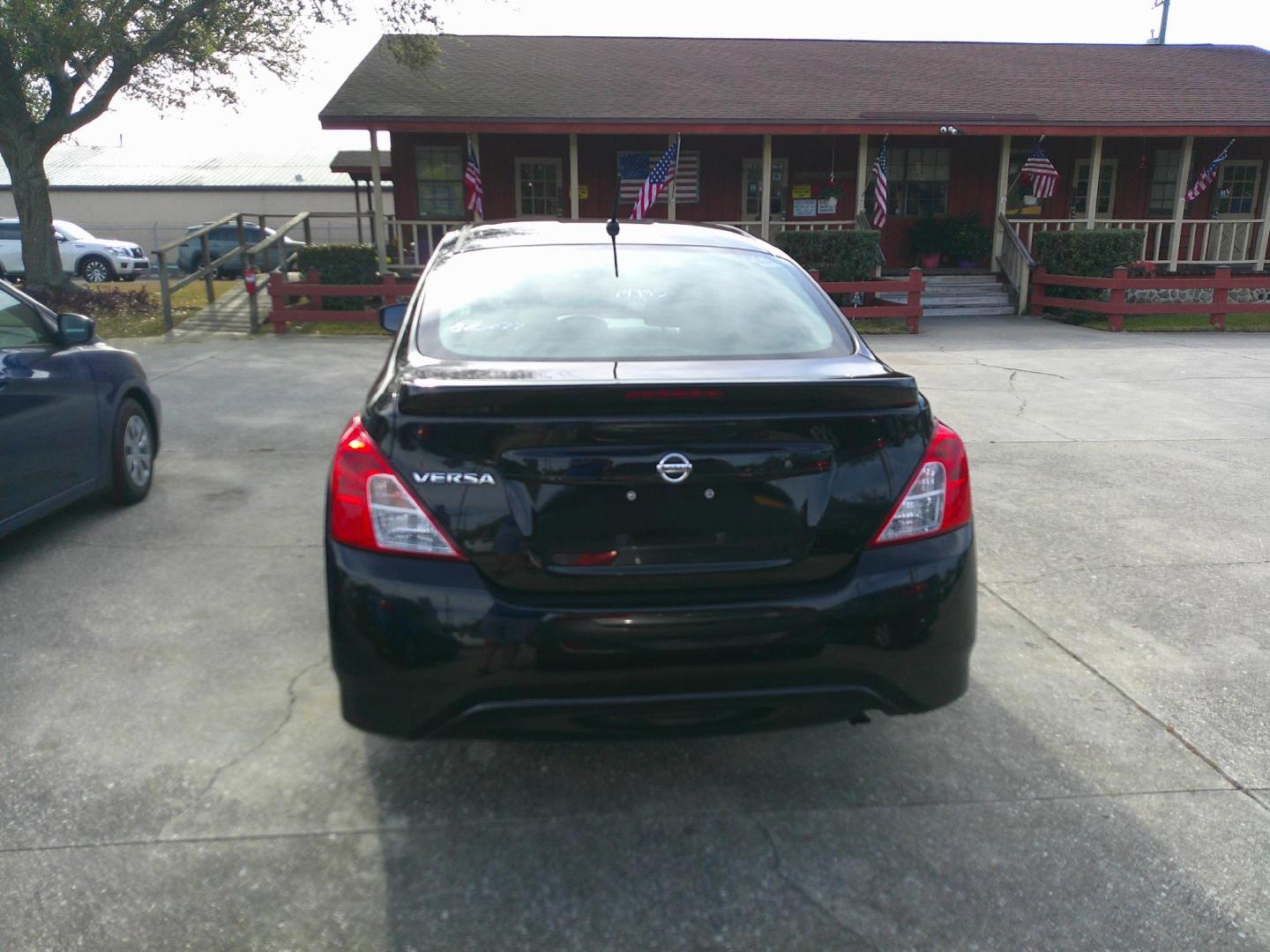 2018 BLACK NISSAN VERSA S; SL; SV (3N1CN7AP2JL) , located at 1200 Cassat Avenue, Jacksonville, FL, 32205, (904) 695-1885, 30.302404, -81.731033 - Photo#5