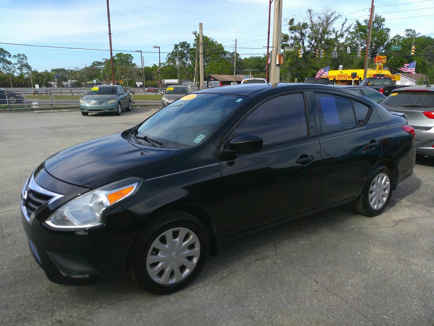 2018 BLACK NISSAN VERSA S; SL; SV (3N1CN7AP2JL) , located at 1200 Cassat Avenue, Jacksonville, FL, 32205, (904) 695-1885, 30.302404, -81.731033 - Photo#1