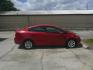 2014 RED KIA RIO LX (KNADM4A34E6) , located at 1200 Cassat Avenue, Jacksonville, FL, 32205, (904) 695-1885, 30.302404, -81.731033 - Photo#4