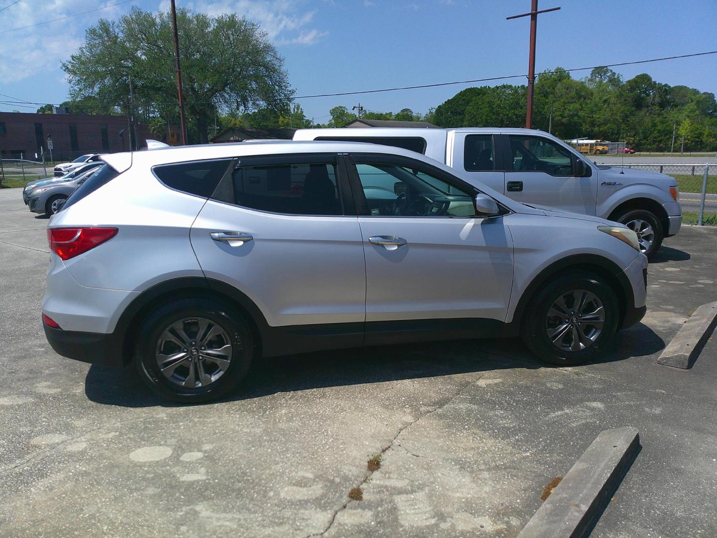 2014 SILVER HYUNDAI SANTA FE SPORT (5XYZT3LB1EG) , located at 1200 Cassat Avenue, Jacksonville, FL, 32205, (904) 695-1885, 30.302404, -81.731033 - Photo#2