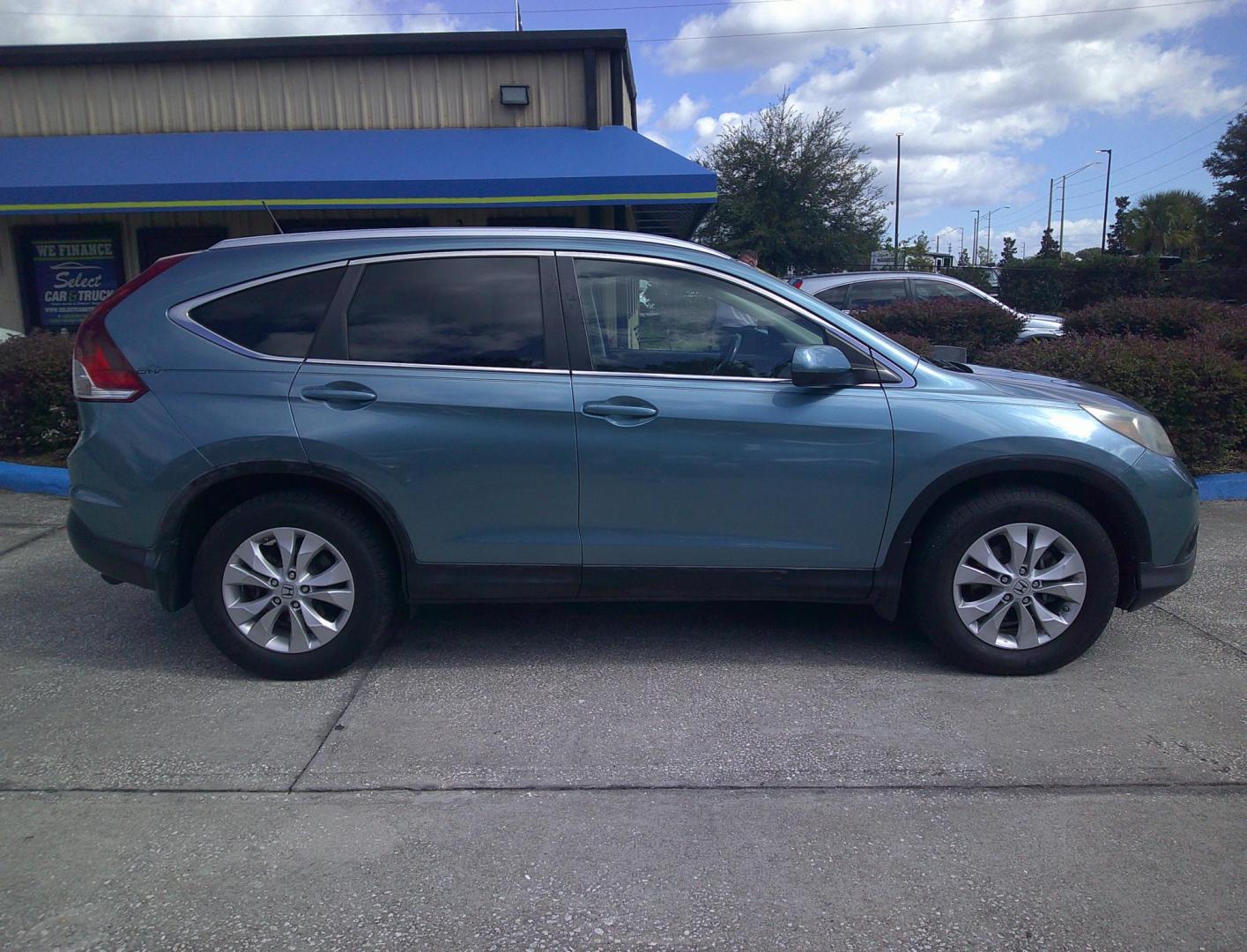 2013 BLUE HONDA CR-V EX-L (5J6RM3H70DL) , located at 390 Hansen Avenue, Orange Park, FL, 32065, (904) 276-7933, 30.130497, -81.787529 - Photo#2