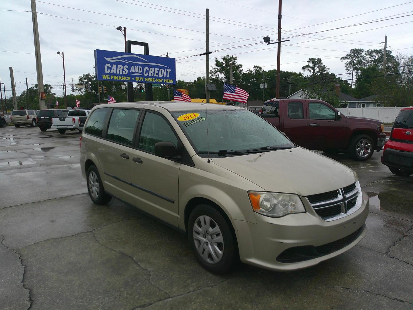2014 TAN DODGE GRAND CARAVAN SE (2C4RDGBGXER) , located at 390 Hansen Avenue, Orange Park, FL, 32065, (904) 276-7933, 30.130497, -81.787529 - Photo#0