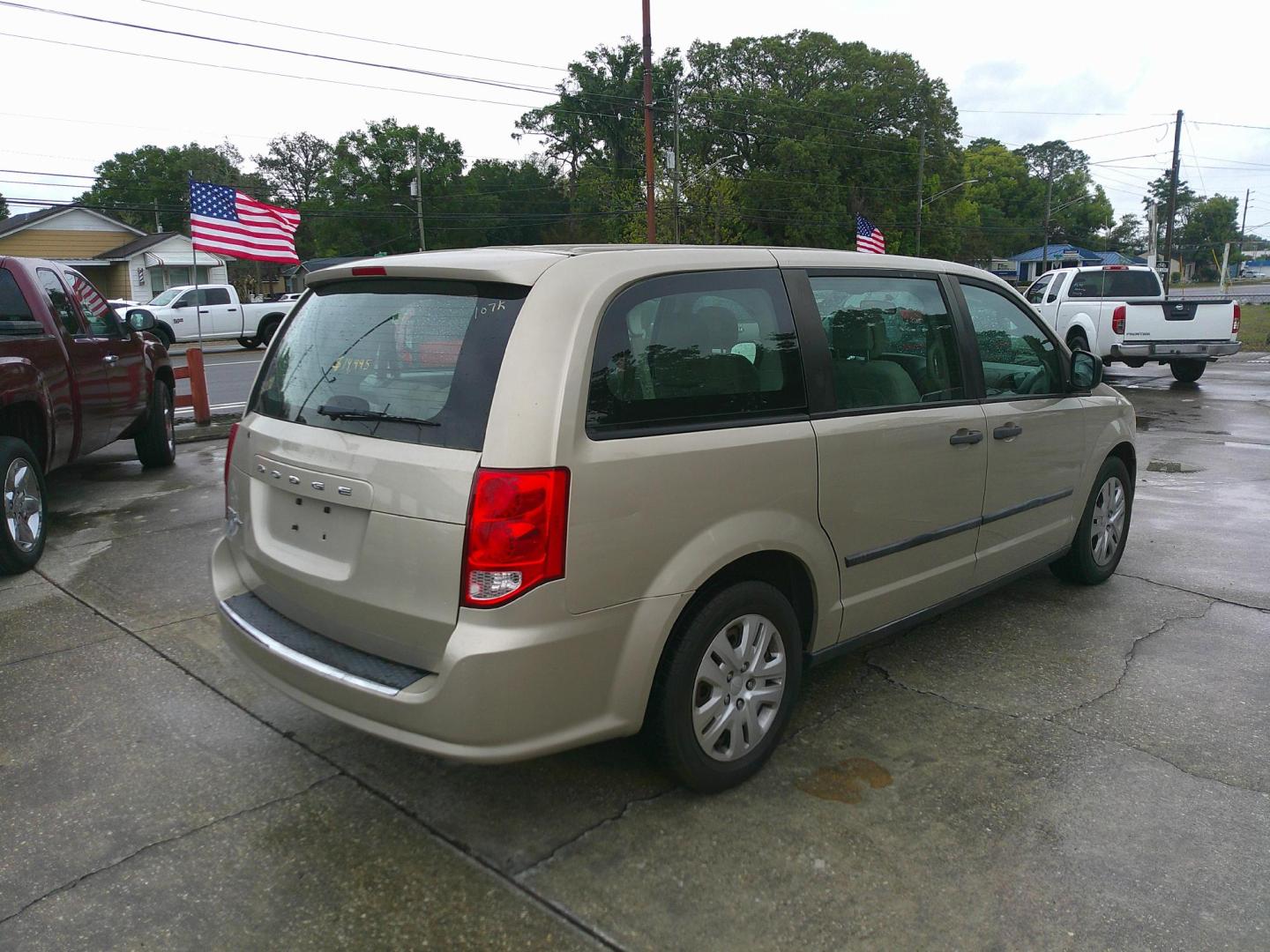 2014 TAN DODGE GRAND CARAVAN SE (2C4RDGBGXER) , located at 390 Hansen Avenue, Orange Park, FL, 32065, (904) 276-7933, 30.130497, -81.787529 - Photo#7