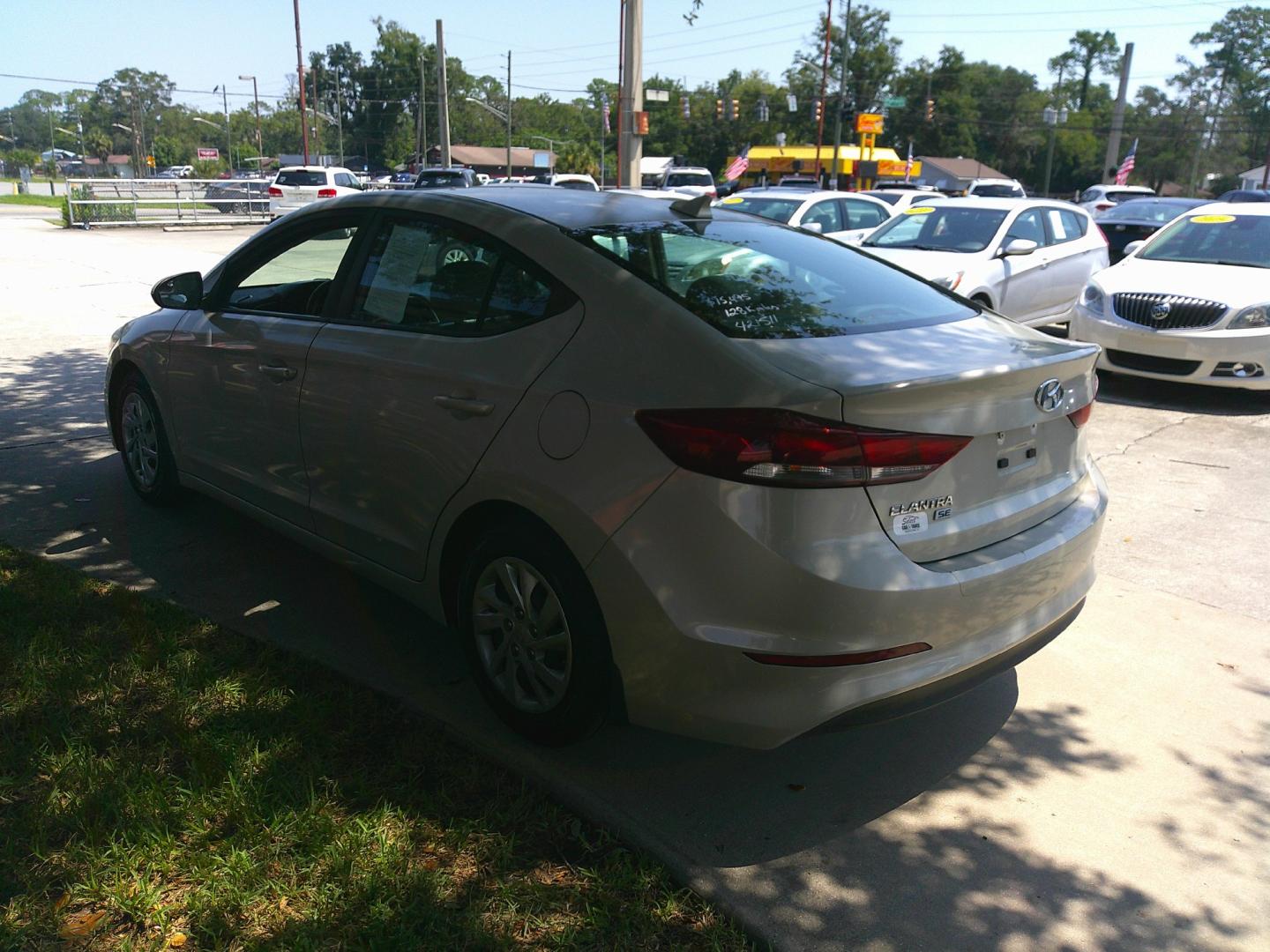 2017 TAN HYUNDAI ELANTRA LIMITED; SE (KMHD74LF7HU) , located at 390 Hansen Avenue, Orange Park, FL, 32065, (904) 276-7933, 30.130497, -81.787529- Photo#4