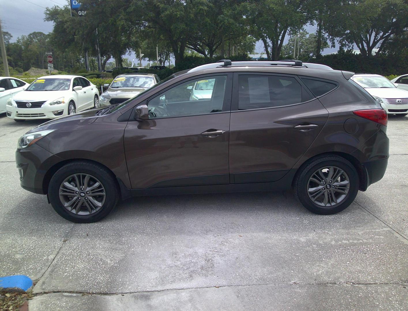 2014 BROWN HYUNDAI TUCSON LIMITED; SE (KM8JU3AG4EU) , located at 390 Hansen Avenue, Orange Park, FL, 32065, (904) 276-7933, 30.130497, -81.787529 - Photo#2
