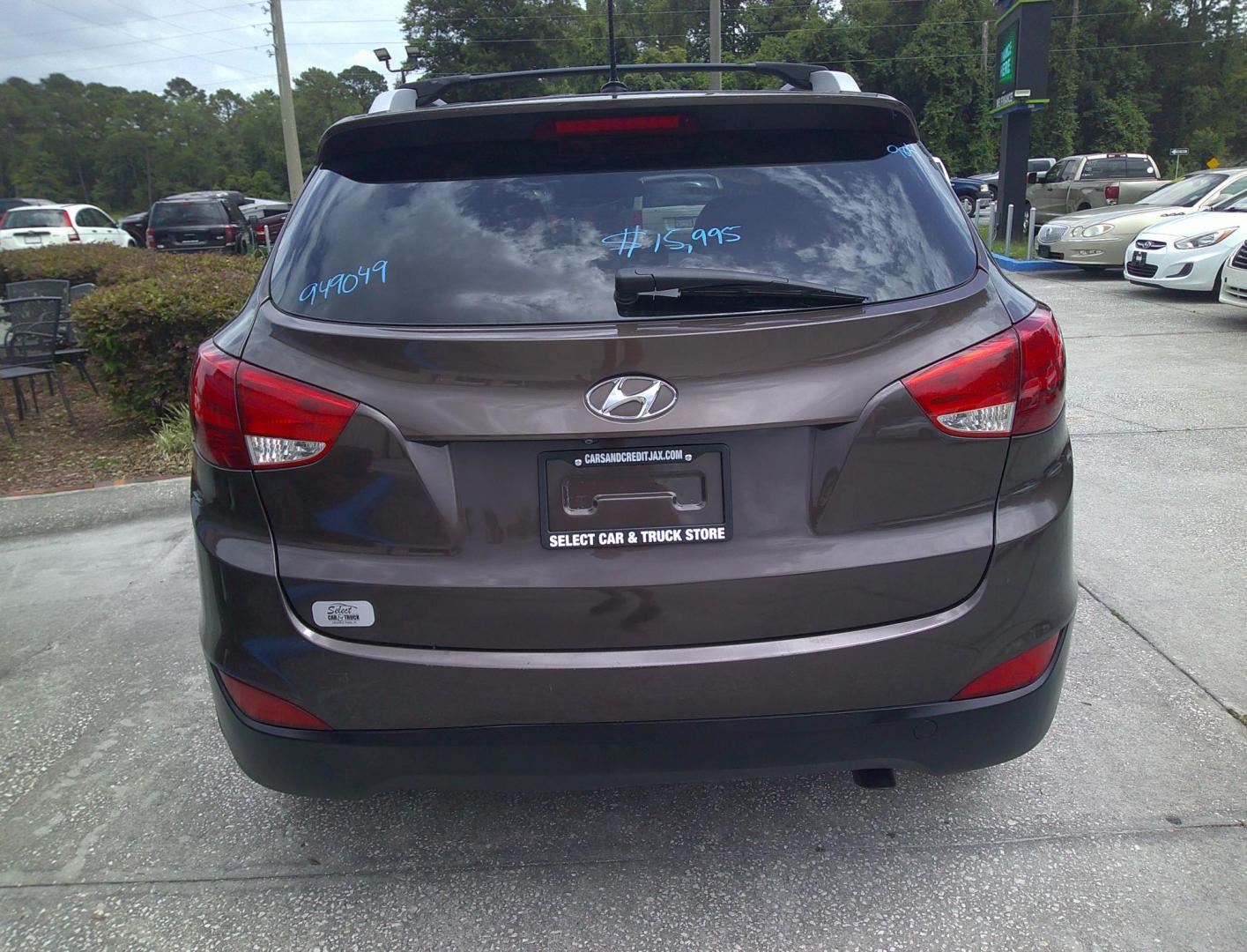 2014 BROWN HYUNDAI TUCSON LIMITED; SE (KM8JU3AG4EU) , located at 390 Hansen Avenue, Orange Park, FL, 32065, (904) 276-7933, 30.130497, -81.787529 - Photo#4