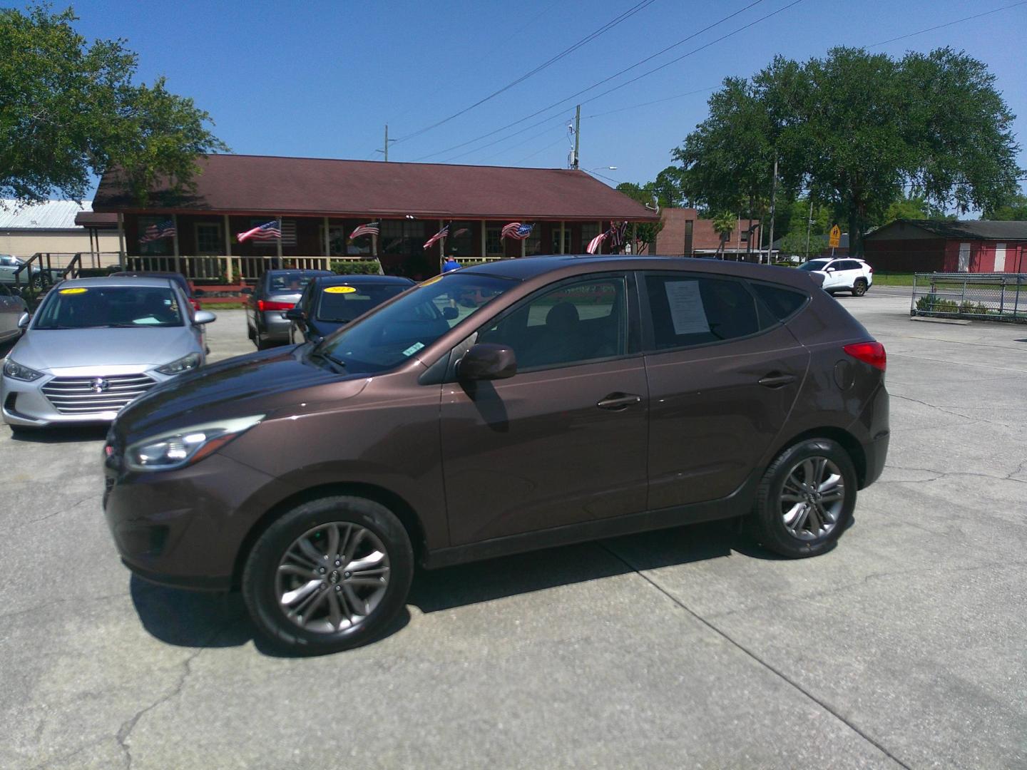 2014 BROWN HYUNDAI TUCSON GLS (KM8JT3AF7EU) , located at 10405 Abercorn Street, Savannah, GA, 31419, (912) 921-8965, 31.988262, -81.131760 - Photo#1