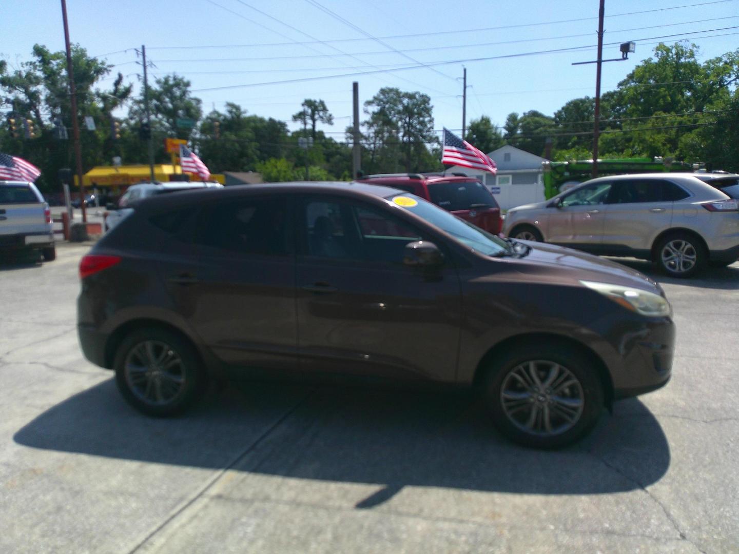 2014 BROWN HYUNDAI TUCSON GLS (KM8JT3AF7EU) , located at 10405 Abercorn Street, Savannah, GA, 31419, (912) 921-8965, 31.988262, -81.131760 - Photo#2