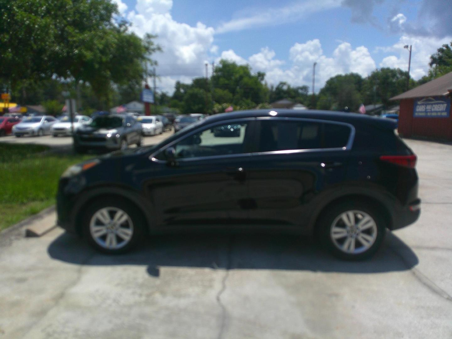 2017 CHERRY KIA SPORTAGE LX (KNDPM3AC1H7) , located at 10405 Abercorn Street, Savannah, GA, 31419, (912) 921-8965, 31.988262, -81.131760 - Photo#1