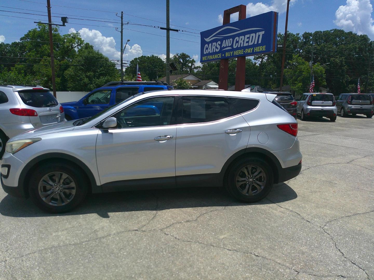 2014 SILVER HYUNDAI SANTA FE SPORT BASE (5XYZU3LB6EG) , located at 1200 Cassat Avenue, Jacksonville, FL, 32205, (904) 695-1885, 30.302404, -81.731033 - Photo#1