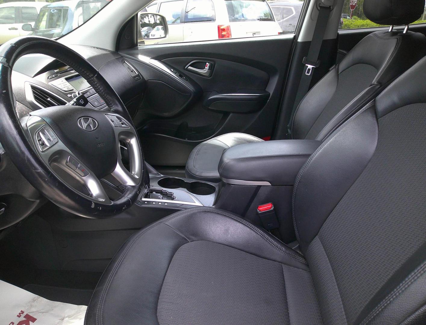 2012 GOLD HYUNDAI TUCSON GLS; LIMITED (KM8JU3AC5CU) , located at 390 Hansen Avenue, Orange Park, FL, 32065, (904) 276-7933, 30.130497, -81.787529 - Photo#1