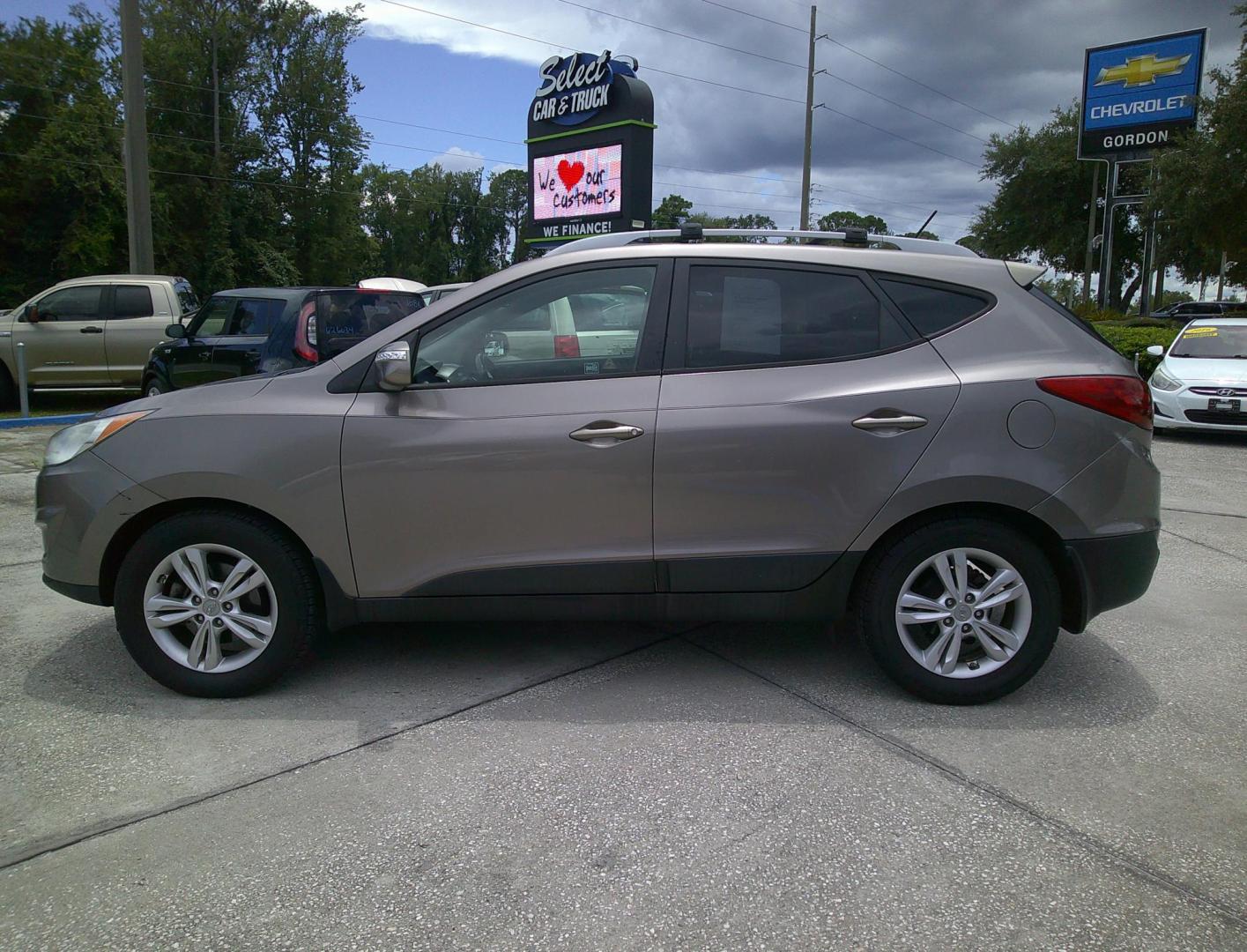 2012 GOLD HYUNDAI TUCSON GLS; LIMITED (KM8JU3AC5CU) , located at 390 Hansen Avenue, Orange Park, FL, 32065, (904) 276-7933, 30.130497, -81.787529 - Photo#4