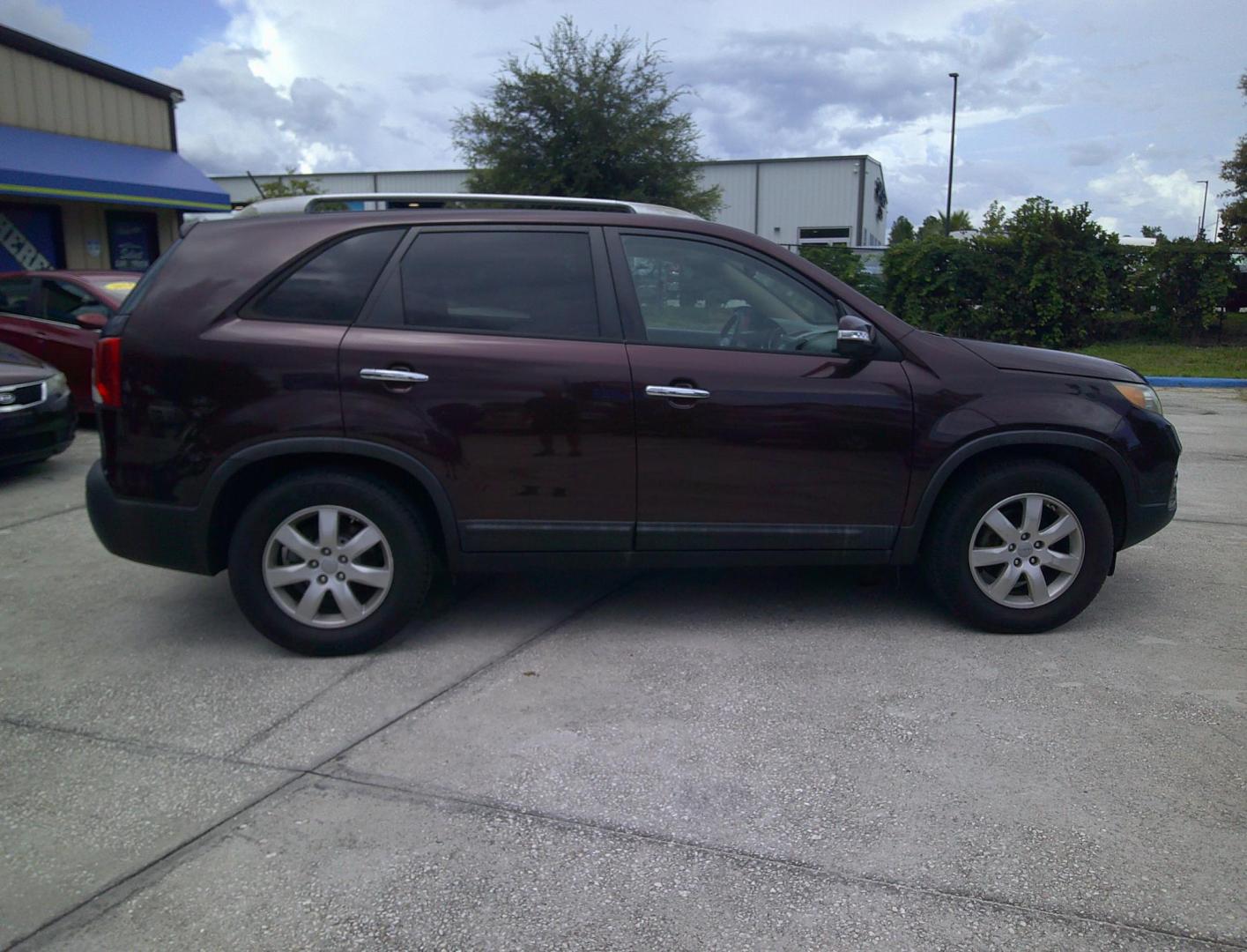 2013 BURGUNDY KIA SORENTO EX; LX (5XYKT3A66DG) , located at 390 Hansen Avenue, Orange Park, FL, 32065, (904) 276-7933, 30.130497, -81.787529 - Photo#2