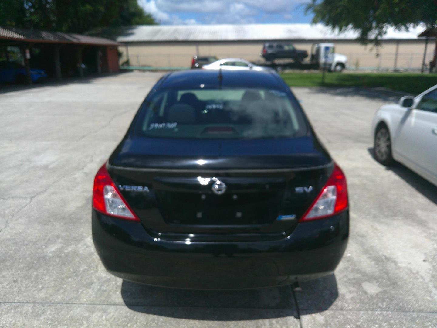 2012 BLACK NISSAN VERSA S; SL; SV (3N1CN7AP1CL) , located at 10405 Abercorn Street, Savannah, GA, 31419, (912) 921-8965, 31.988262, -81.131760 - Photo#4