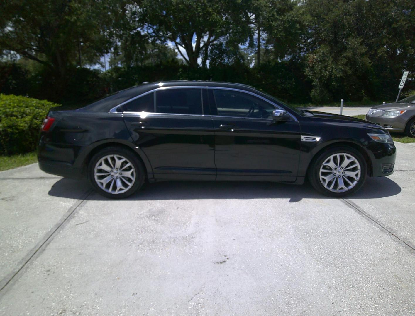 2013 BLACK FORD TAURUS LIMITED (1FAHP2F8XDG) , located at 390 Hansen Avenue, Orange Park, FL, 32065, (904) 276-7933, 30.130497, -81.787529 - Photo#2