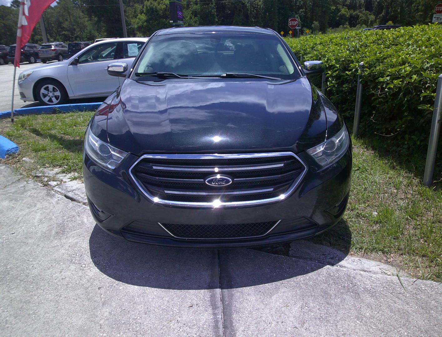 2013 BLACK FORD TAURUS LIMITED (1FAHP2F8XDG) , located at 390 Hansen Avenue, Orange Park, FL, 32065, (904) 276-7933, 30.130497, -81.787529 - Photo#0
