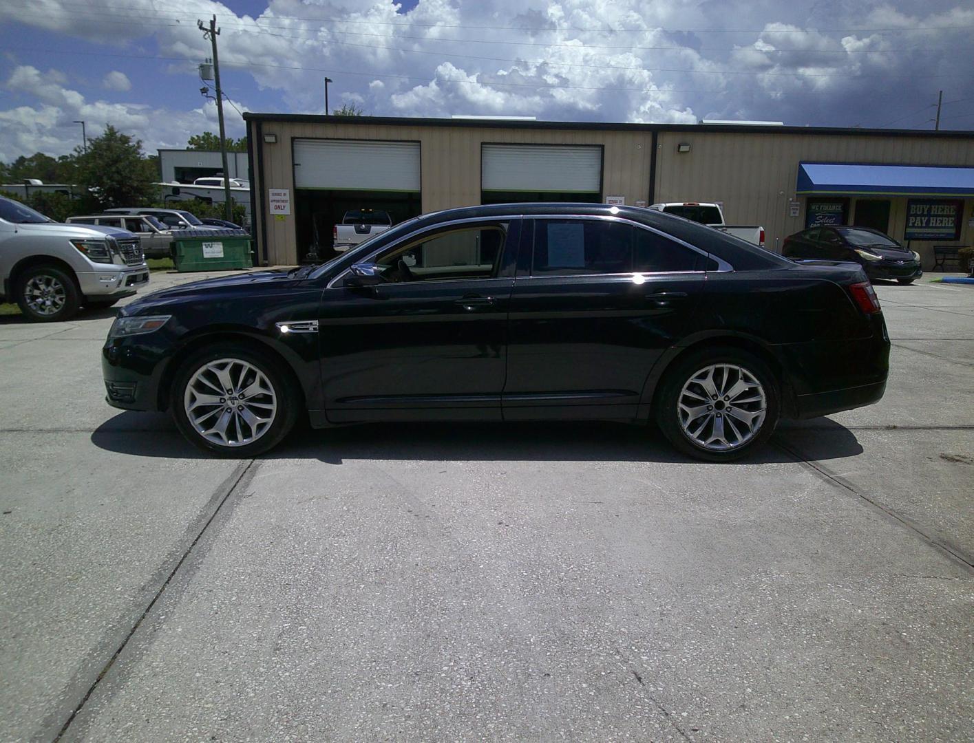 2013 BLACK FORD TAURUS LIMITED (1FAHP2F8XDG) , located at 390 Hansen Avenue, Orange Park, FL, 32065, (904) 276-7933, 30.130497, -81.787529 - Photo#4
