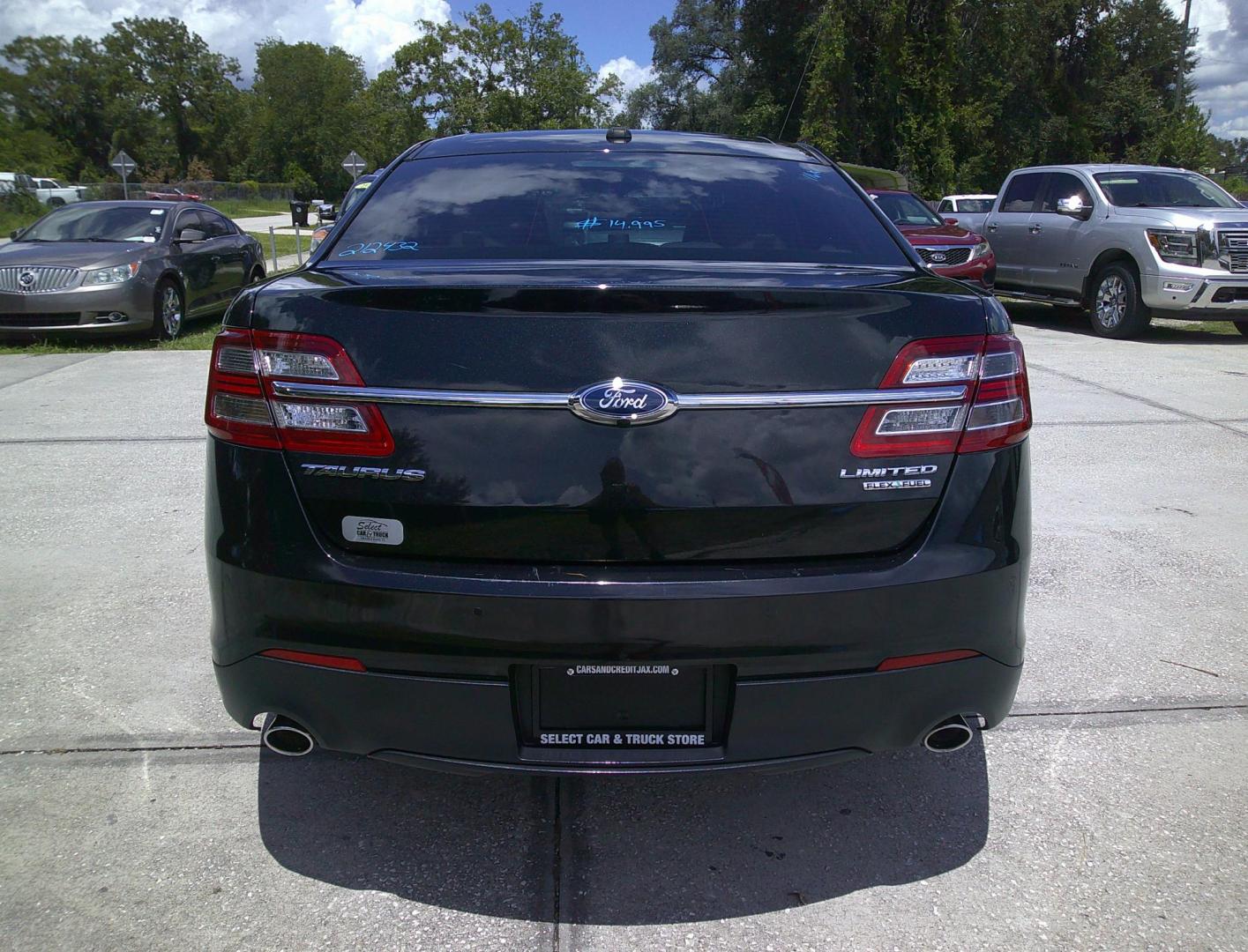 2013 BLACK FORD TAURUS LIMITED (1FAHP2F8XDG) , located at 390 Hansen Avenue, Orange Park, FL, 32065, (904) 276-7933, 30.130497, -81.787529 - Photo#3