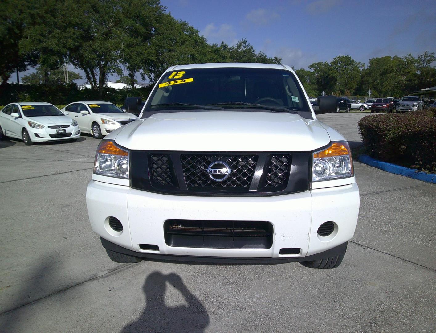 2013 WHITE NISSAN TITAN S; SL; PRO-4X; (1N6AA0CJ9DN) , located at 390 Hansen Avenue, Orange Park, FL, 32065, (904) 276-7933, 30.130497, -81.787529 - Photo#0