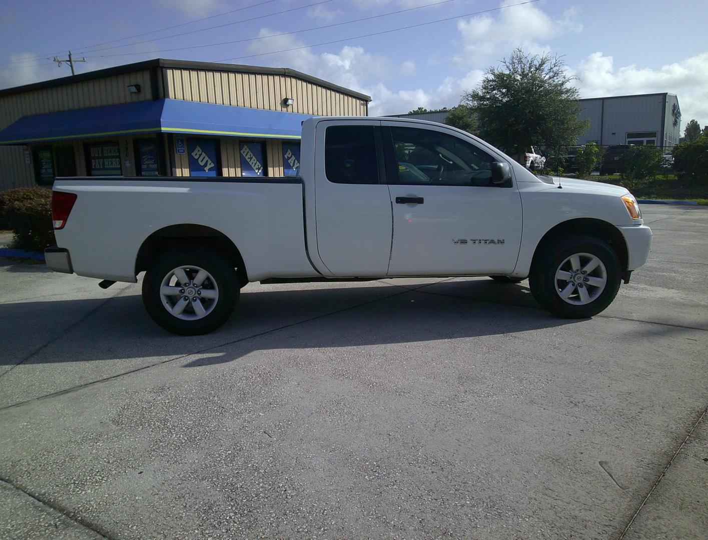 2013 WHITE NISSAN TITAN S; SL; PRO-4X; (1N6AA0CJ9DN) , located at 390 Hansen Avenue, Orange Park, FL, 32065, (904) 276-7933, 30.130497, -81.787529 - Photo#2