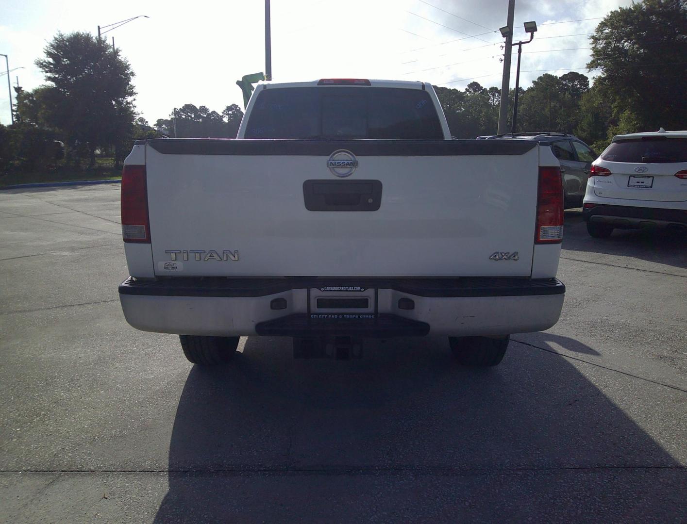 2013 WHITE NISSAN TITAN S; SL; PRO-4X; (1N6AA0CJ9DN) , located at 390 Hansen Avenue, Orange Park, FL, 32065, (904) 276-7933, 30.130497, -81.787529 - Photo#3