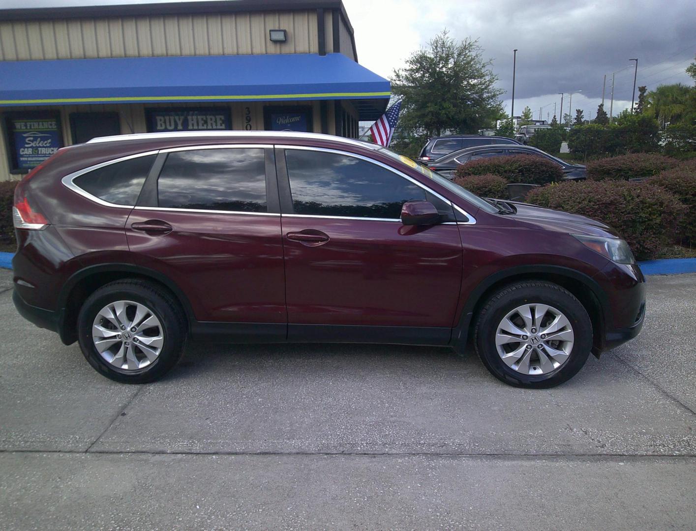 2014 RED HONDA CR-V EX-L (5J6RM3H76EL) , located at 390 Hansen Avenue, Orange Park, FL, 32065, (904) 276-7933, 30.130497, -81.787529 - Photo#1