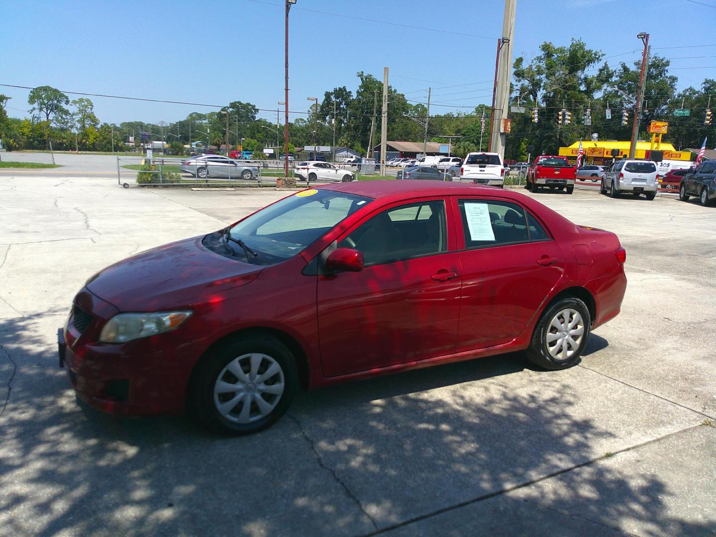2009 RED TOYOTA COROLLA BASE; S; LE; (JTDBL40E399) , located at 390 Hansen Avenue, Orange Park, FL, 32065, (904) 276-7933, 30.130497, -81.787529 - Photo#1