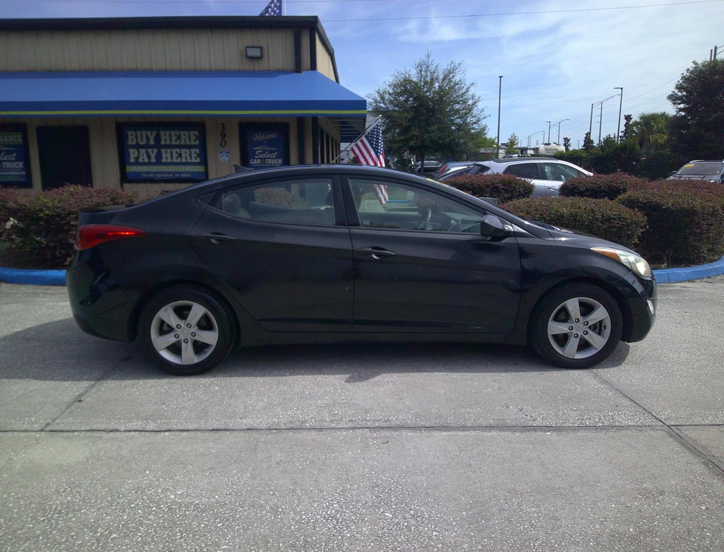 2013 BLACK HYUNDAI ELANTRA GLS; LIMITED (KMHDH4AE8DU) , located at 1200 Cassat Avenue, Jacksonville, FL, 32205, (904) 695-1885, 30.302404, -81.731033 - Photo#2