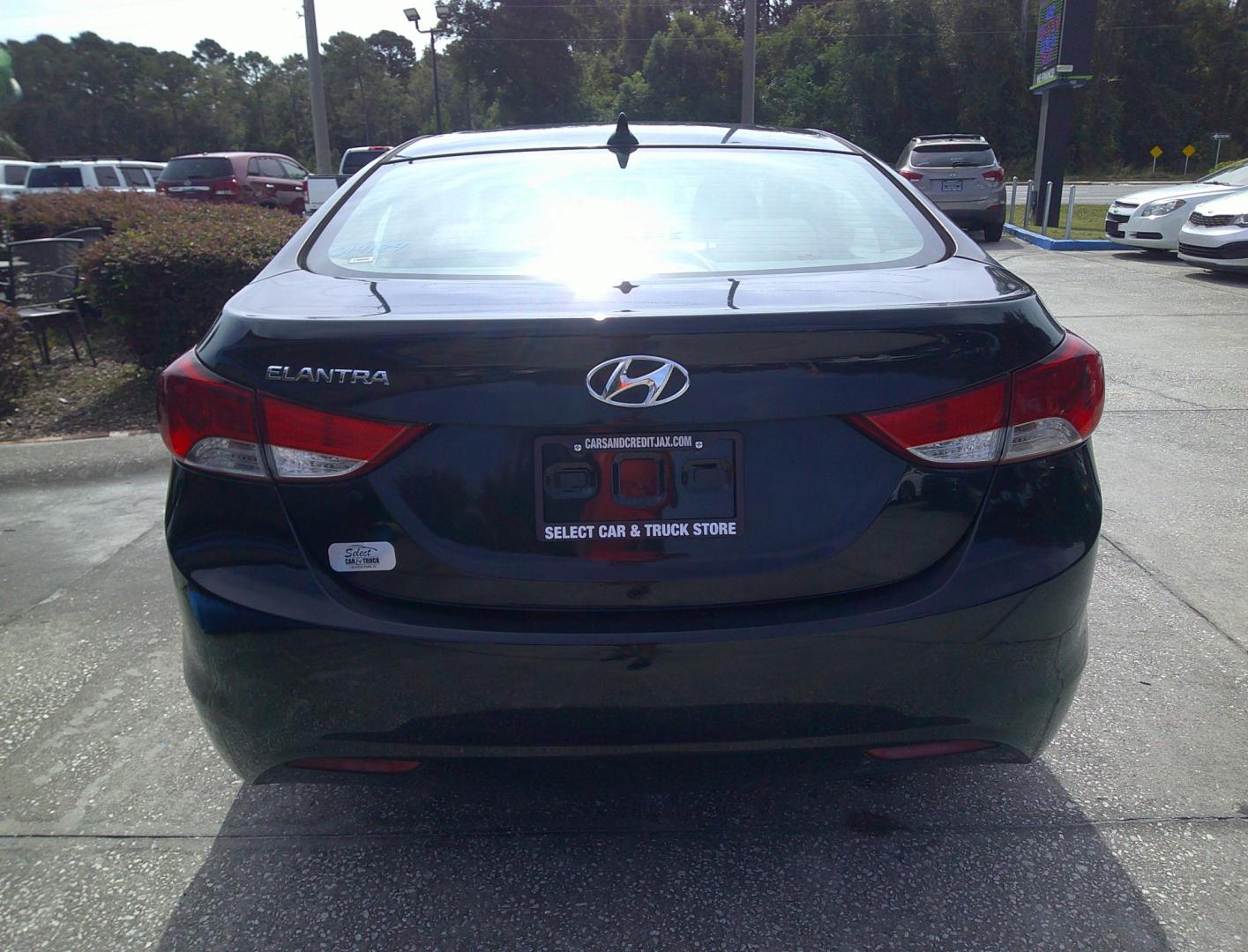 2013 BLACK HYUNDAI ELANTRA GLS; LIMITED (KMHDH4AE8DU) , located at 1200 Cassat Avenue, Jacksonville, FL, 32205, (904) 695-1885, 30.302404, -81.731033 - Photo#3