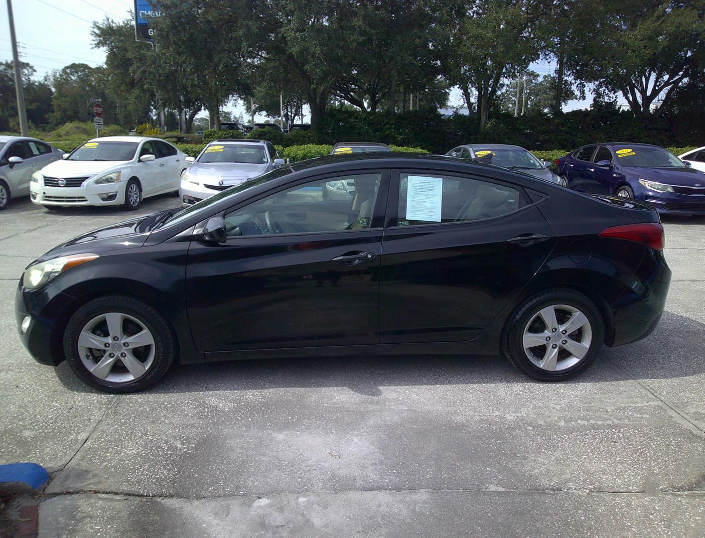 2013 BLACK HYUNDAI ELANTRA GLS; LIMITED (KMHDH4AE8DU) , located at 1200 Cassat Avenue, Jacksonville, FL, 32205, (904) 695-1885, 30.302404, -81.731033 - Photo#4
