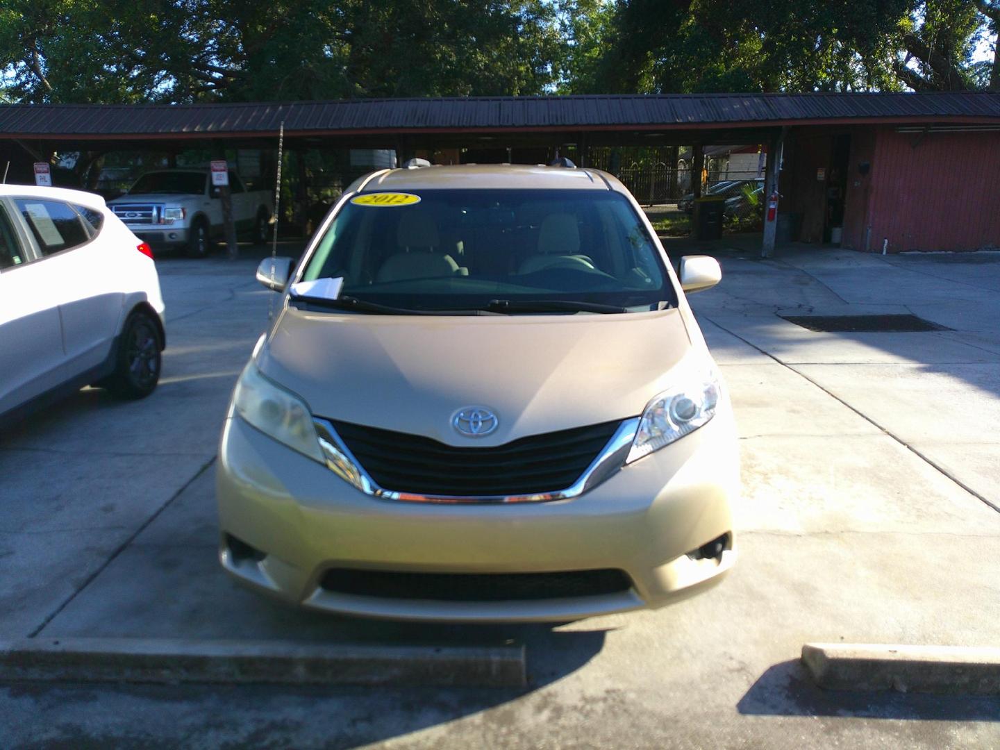 2012 GOLD TOYOTA SIENNA BASE; LIMITED (5TDKK3DC8CS) , located at 1200 Cassat Avenue, Jacksonville, FL, 32205, (904) 695-1885, 30.302404, -81.731033 - Photo#0