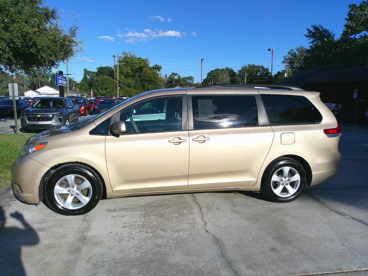 2012 GOLD TOYOTA SIENNA BASE; LIMITED (5TDKK3DC8CS) , located at 1200 Cassat Avenue, Jacksonville, FL, 32205, (904) 695-1885, 30.302404, -81.731033 - Photo#1