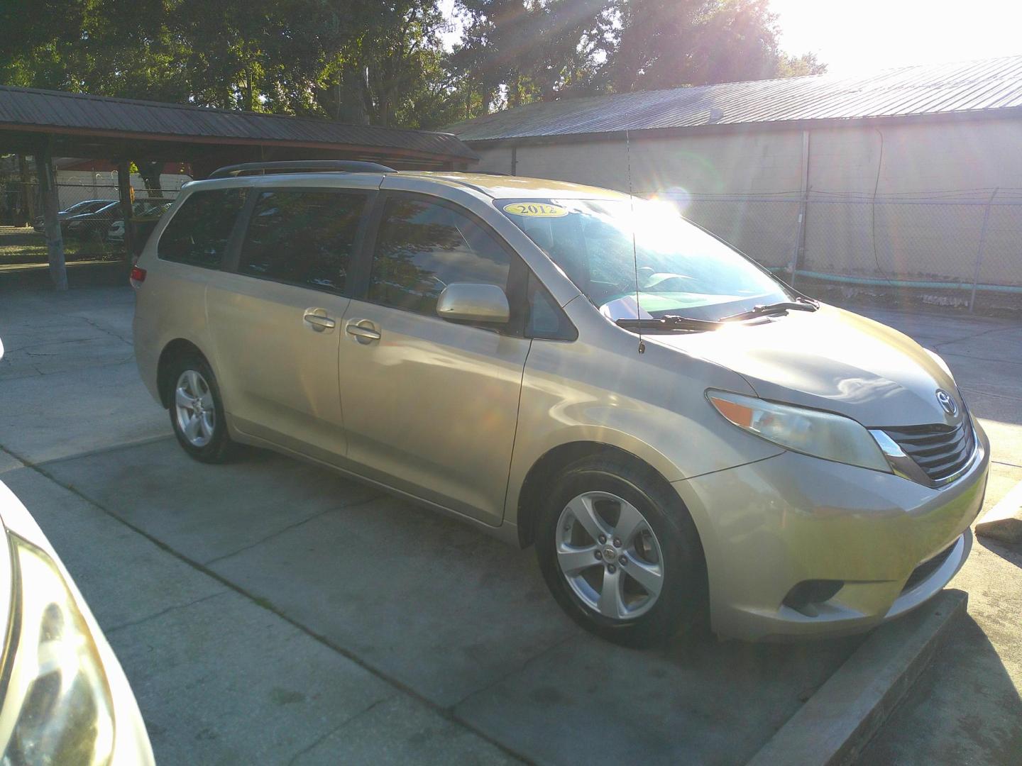 2012 GOLD TOYOTA SIENNA BASE; LIMITED (5TDKK3DC8CS) , located at 1200 Cassat Avenue, Jacksonville, FL, 32205, (904) 695-1885, 30.302404, -81.731033 - Photo#4