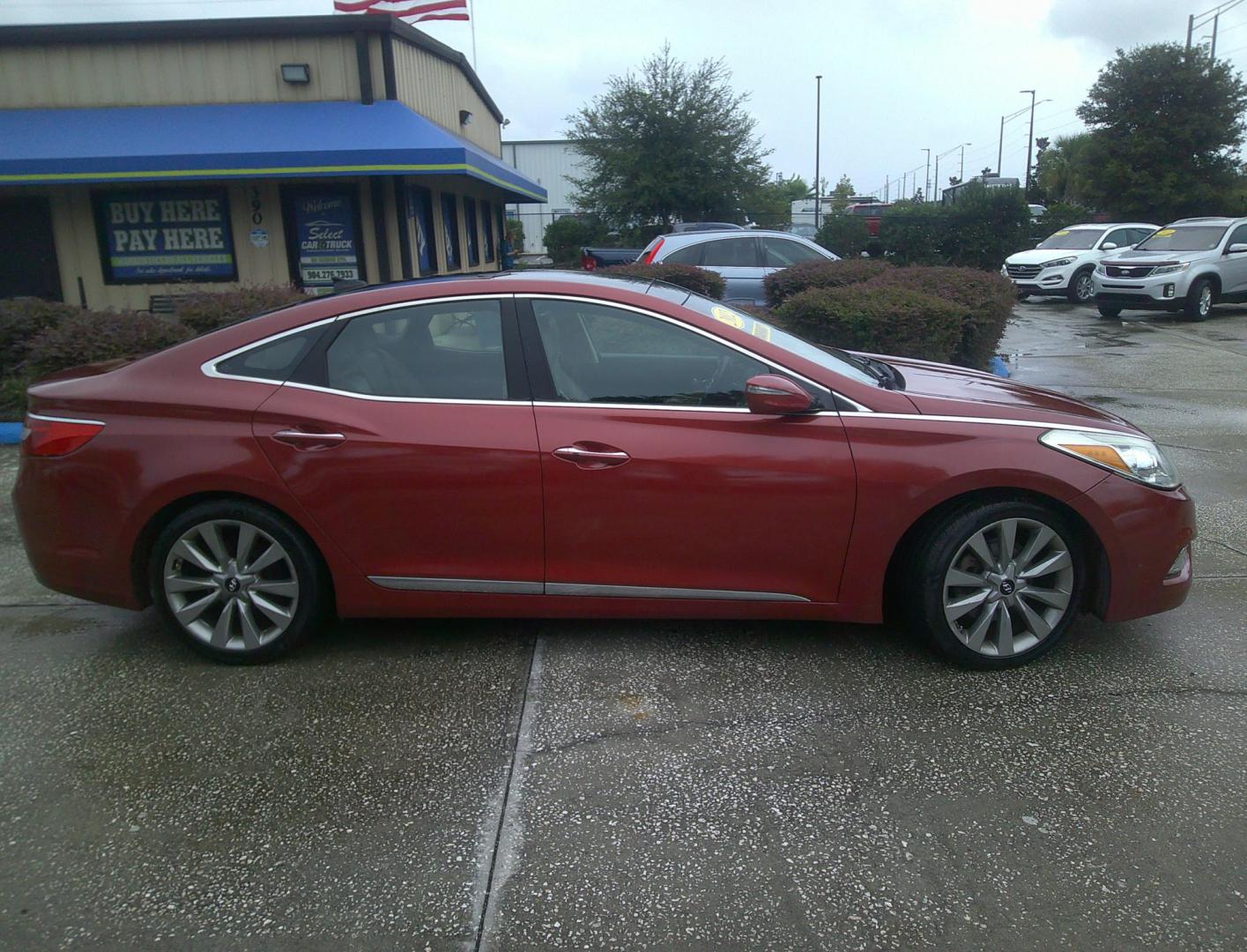 2012 RED HYUNDAI AZERA GLS; LIMITED (KMHFH4JG1CA) , located at 390 Hansen Avenue, Orange Park, FL, 32065, (904) 276-7933, 30.130497, -81.787529 - Photo#1