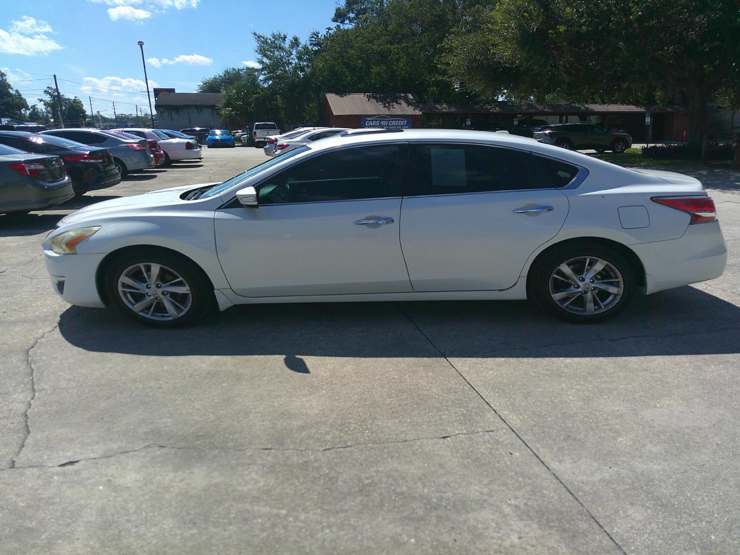 2015 WHITE NISSAN ALTIMA (1N4AL3AP7FC) , located at 390 Hansen Avenue, Orange Park, FL, 32065, (904) 276-7933, 30.130497, -81.787529- Photo#1