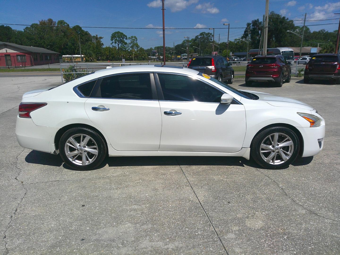 2015 WHITE NISSAN ALTIMA (1N4AL3AP7FC) , located at 390 Hansen Avenue, Orange Park, FL, 32065, (904) 276-7933, 30.130497, -81.787529- Photo#4