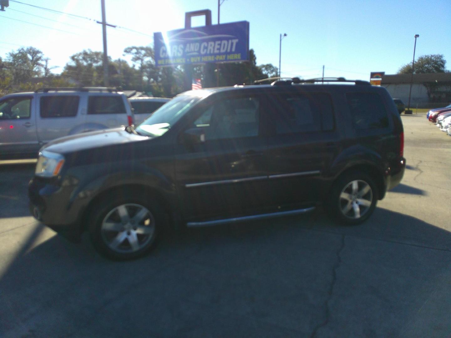 2012 BROWN HONDA PILOT TOURING-RES (5FNYF3H93CB) , located at 1200 Cassat Avenue, Jacksonville, FL, 32205, (904) 695-1885, 30.302404, -81.731033 - Photo#1