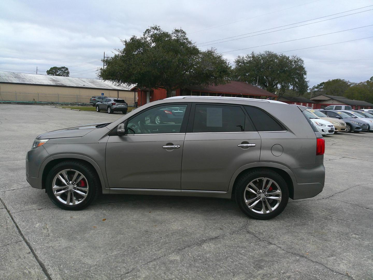 2014 TAN KIA SORENTO LIMITED; SX (5XYKW4A72EG) , located at 1200 Cassat Avenue, Jacksonville, FL, 32205, (904) 695-1885, 30.302404, -81.731033 - Photo#1