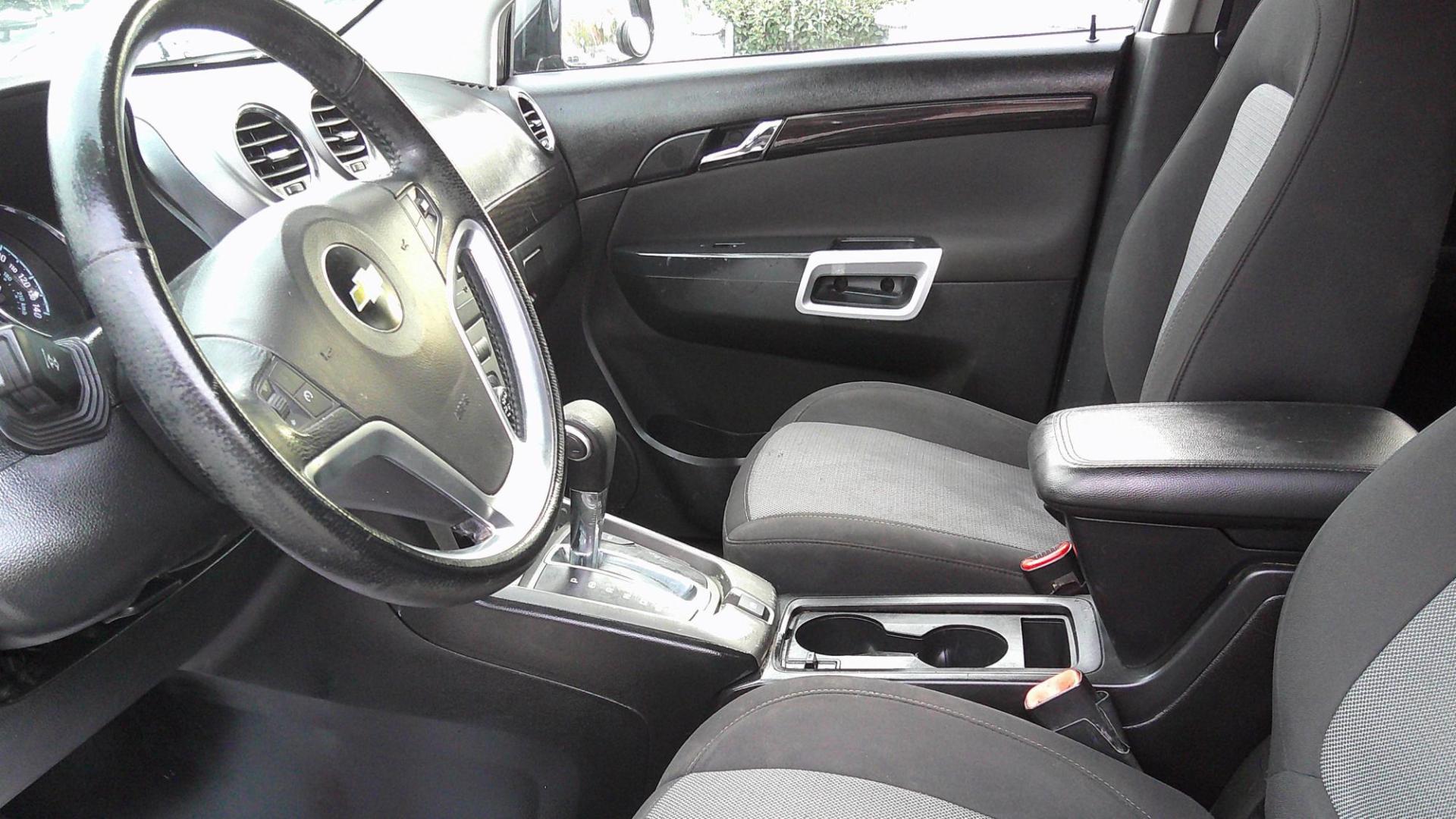 2015 BLACK CHEVROLET CAPTIVA SPORT 1LT (3GNAL3EK9FS) , located at 390 Hansen Avenue, Orange Park, FL, 32065, (904) 276-7933, 30.130497, -81.787529 - Photo#1